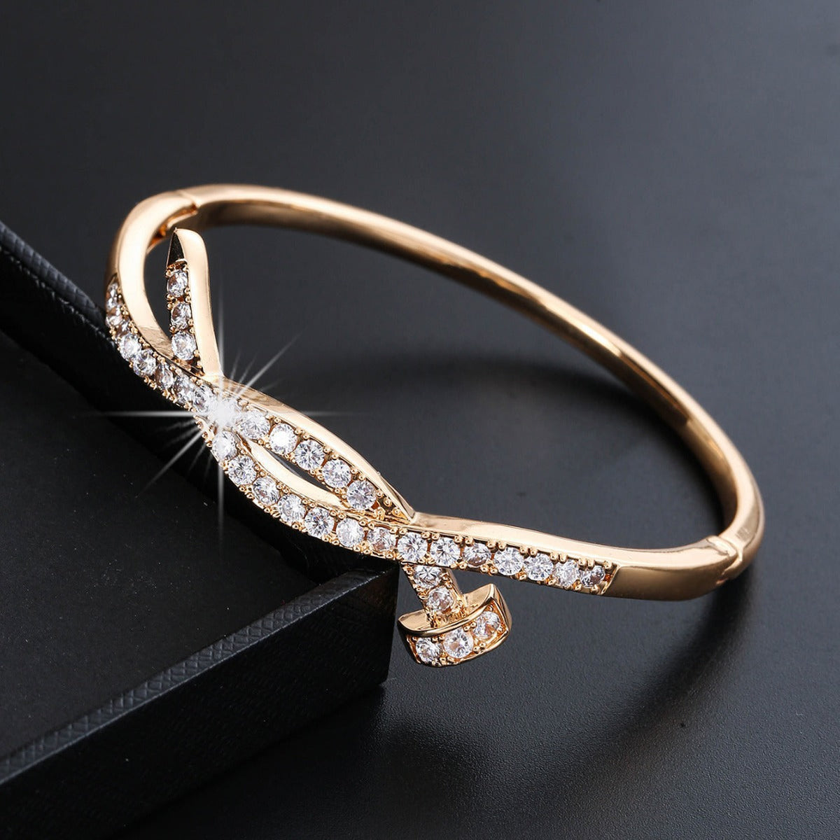 Women's Bracelet with Elaborate Infinity Symbol and Sparkling Zirconia