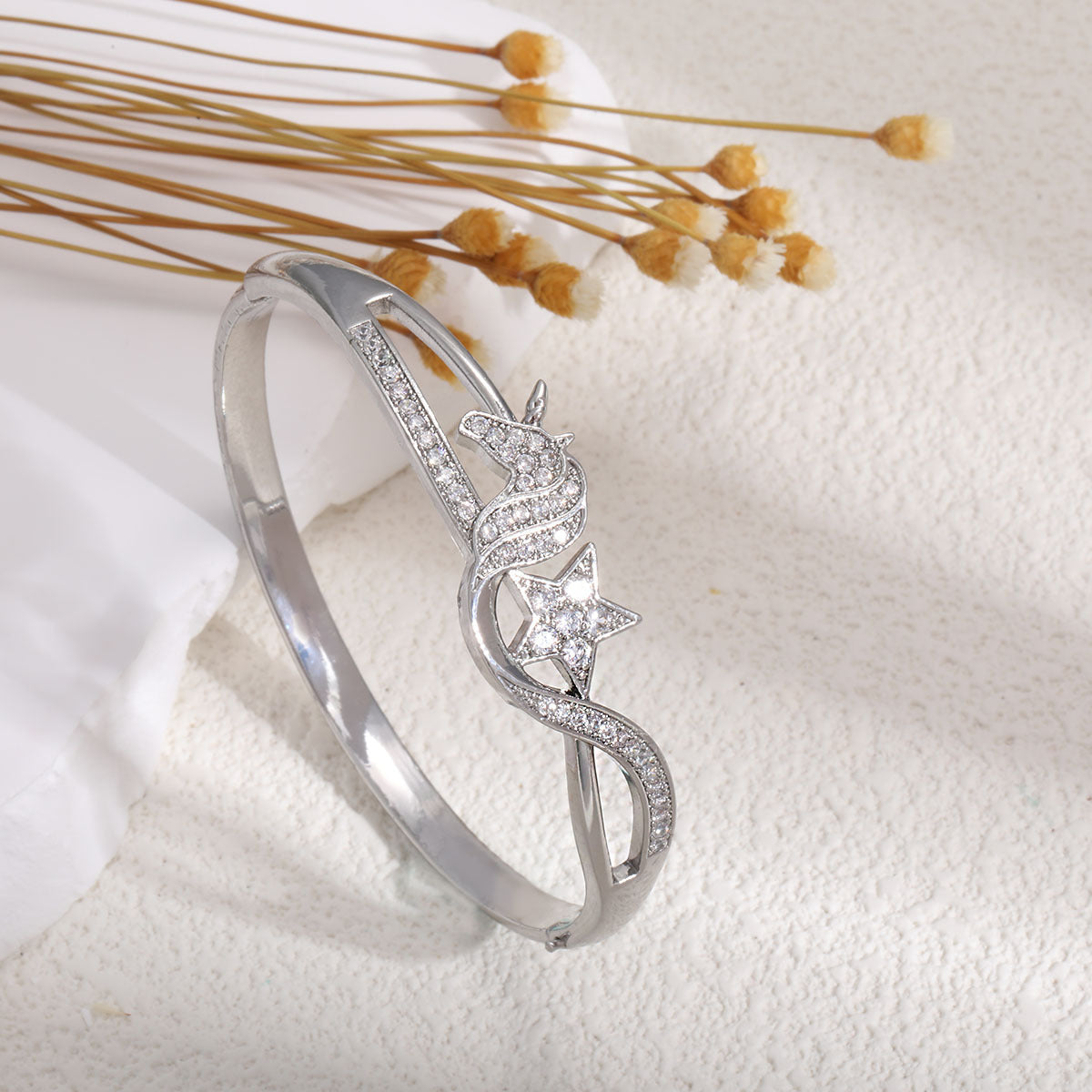 Women's Bangle with Elegant Infinity Pattern and Sparkling Zirconia