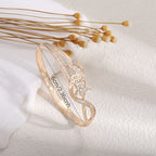 Women's Bracelet with Elaborate Infinity Symbol and Sparkling Zirconia