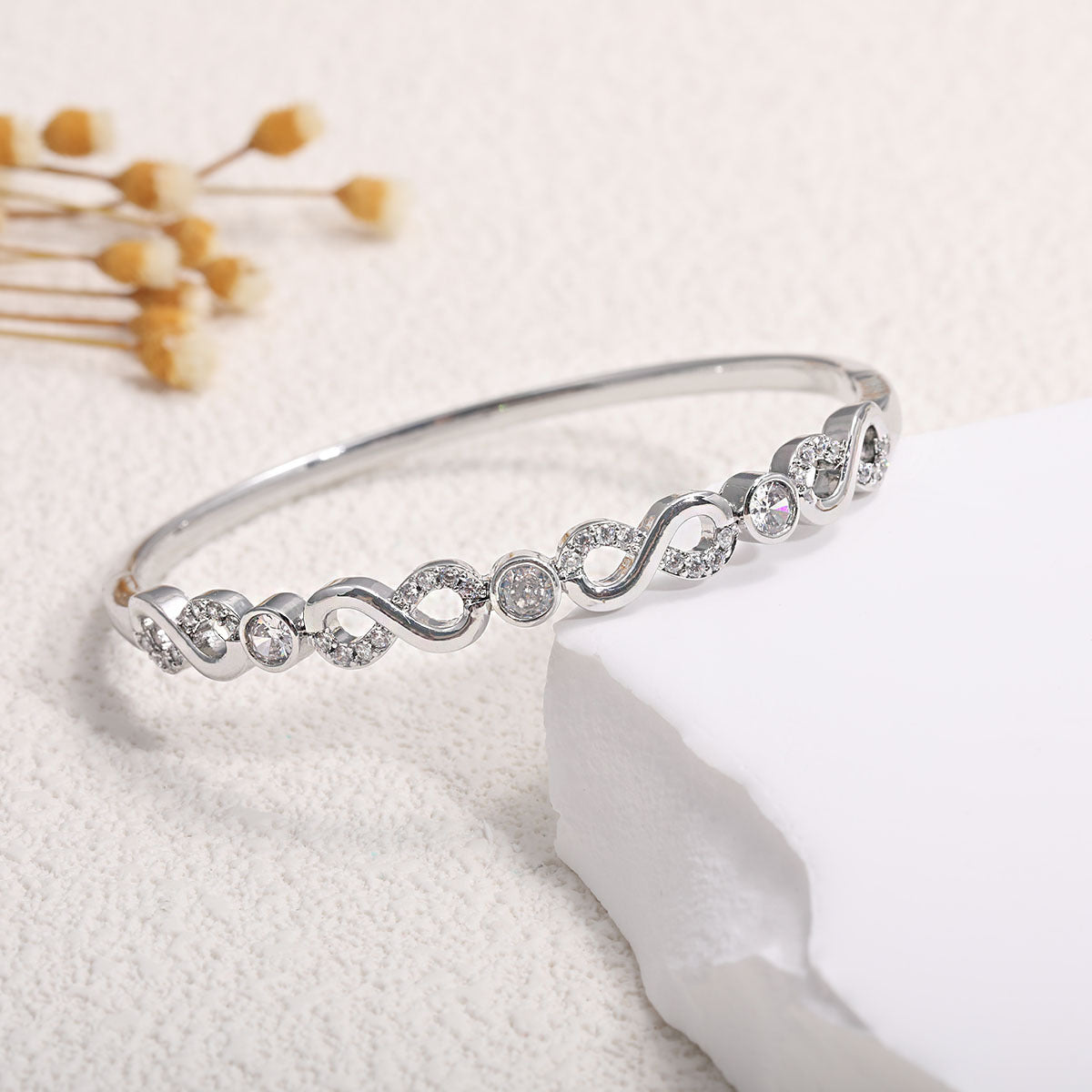 Women's Bracelet with Elaborate Infinity Symbol and Sparkling Zirconia