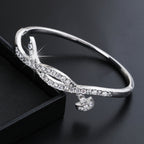 Women's Bracelet with Elaborate Infinity Symbol and Sparkling Zirconia