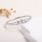 Women's Bracelet with Elaborate Infinity Symbol and Sparkling Zirconia