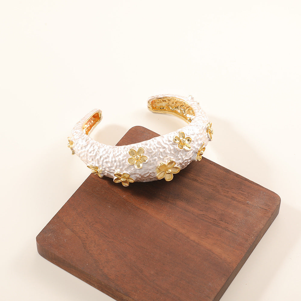 Women's Bracelet with Intricate Flower Design