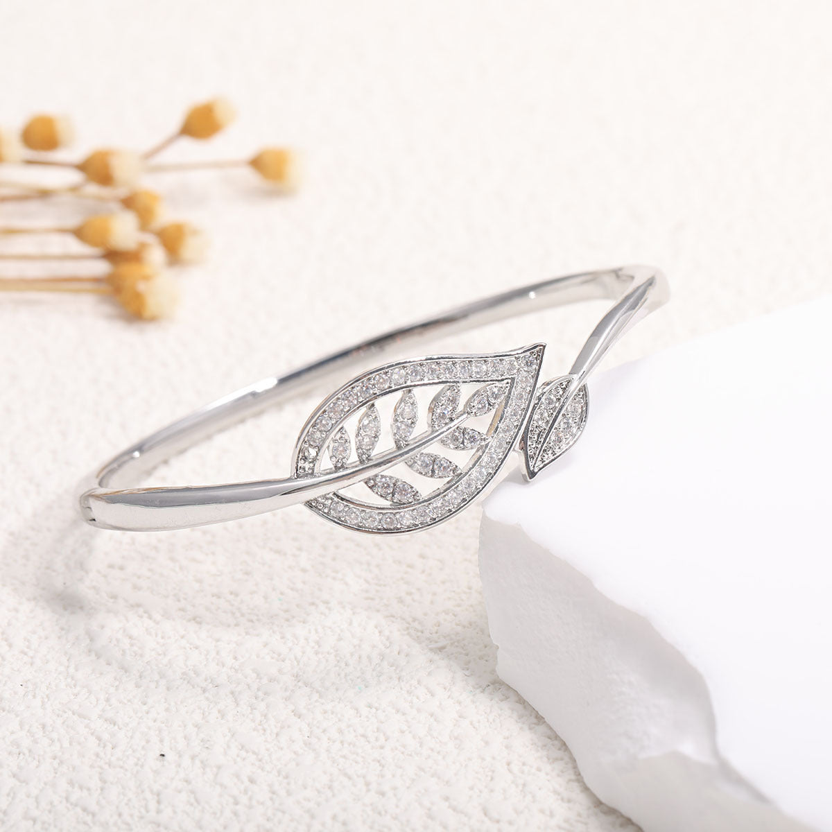 Women's Bangle with Elegant Infinity Pattern and Sparkling Zirconia