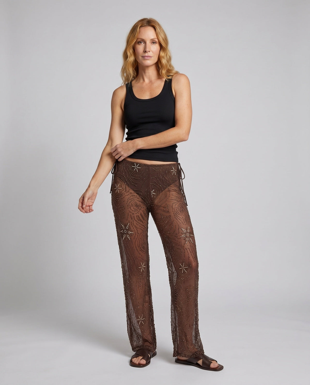 Women's Elegant Transparent Wide-Cut Pants with Embellished Details - Front View