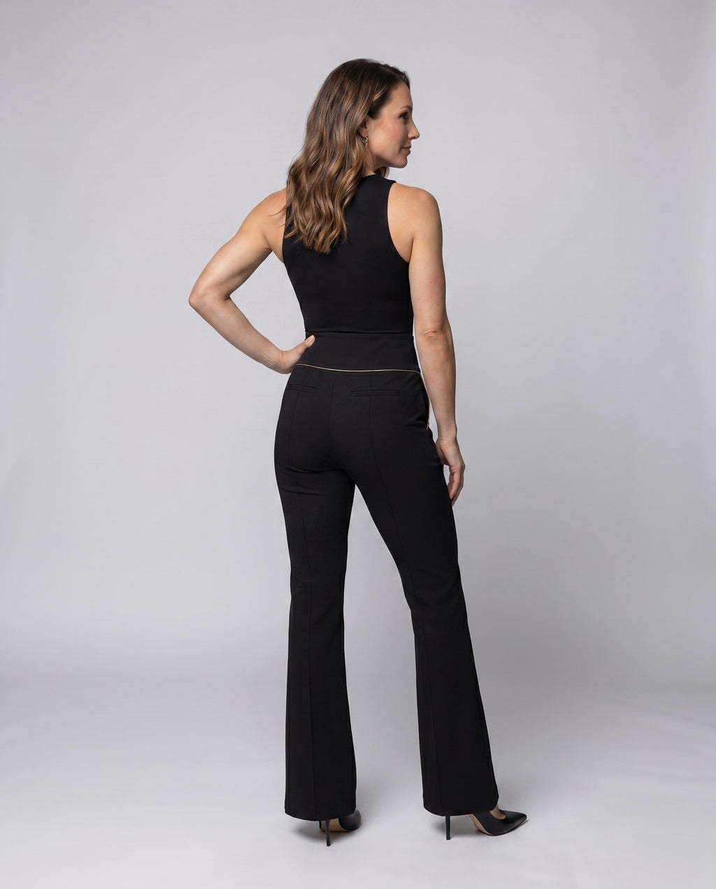 Women's Elegant High-Waisted Trousers with Decorative Button Details - Back View