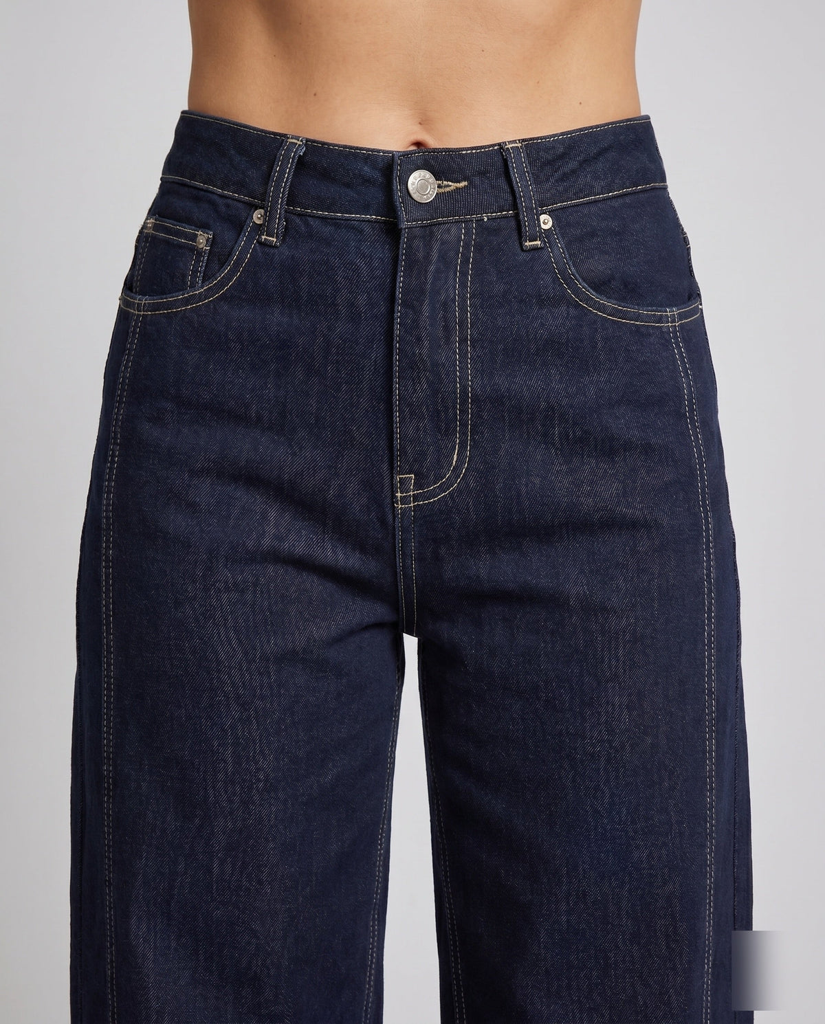 Women's High-Waisted Wide Denim Pants with Striking Contrast Stitching - Close-Up Detail