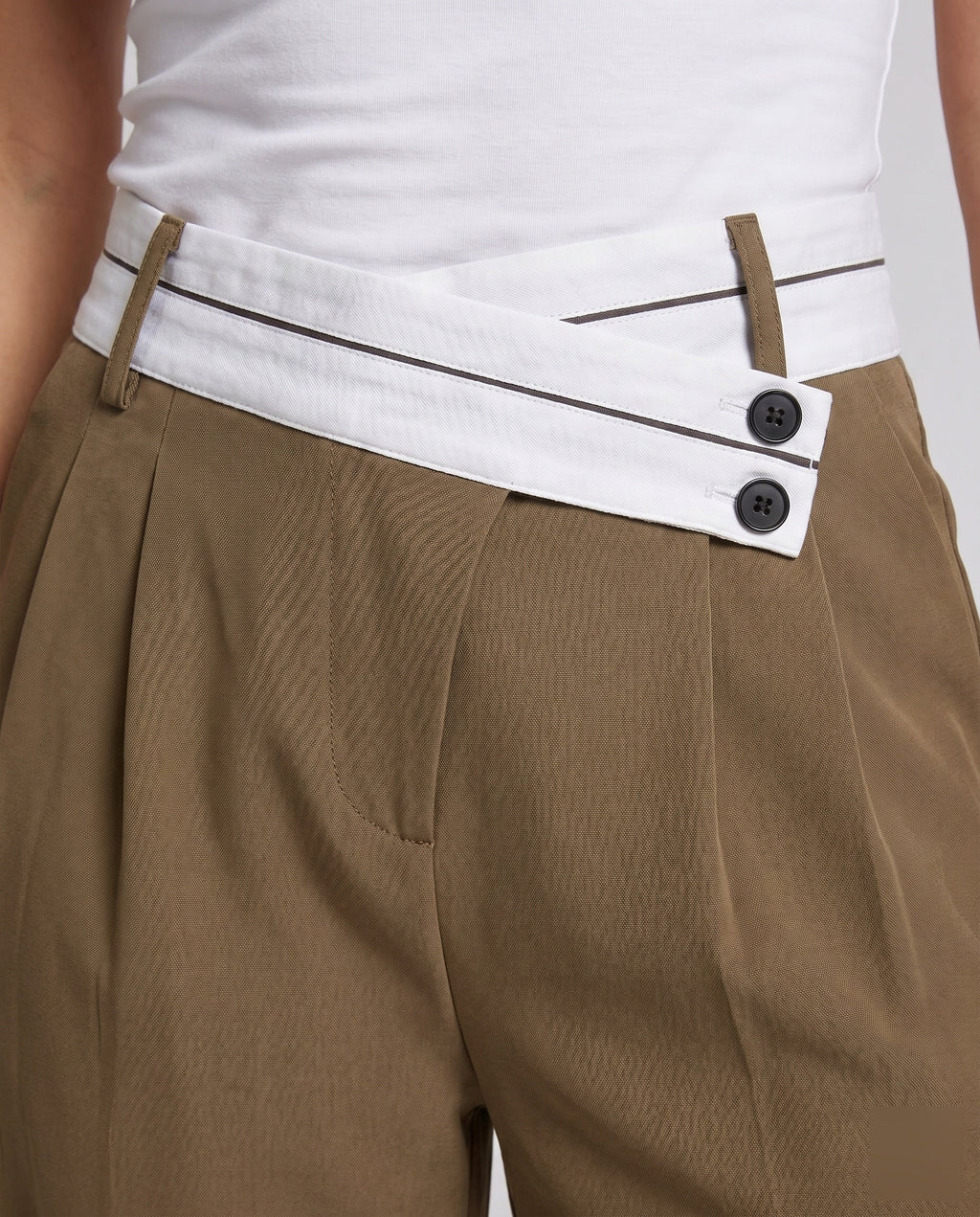 Women's Elegant Tailored Chino Pants with Asymmetric Waistband - Close-Up Detail