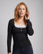 Women's Long-Sleeve Top with Playful Neckline and Elegant Lace - Upper Body View