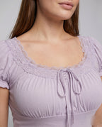 Women's Lace T-Shirt with Elegant Ruffle and Decorative Hem - Close-Up Detail