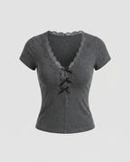 Women's Lace Top with Romantic Ruffle Details and Deep V-Neck