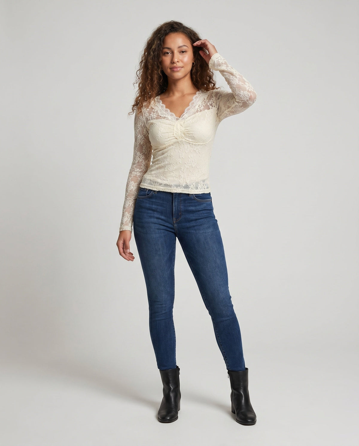 Women's Lace Top with Deep V-Neck and Elegant Ruffle Details - Front View