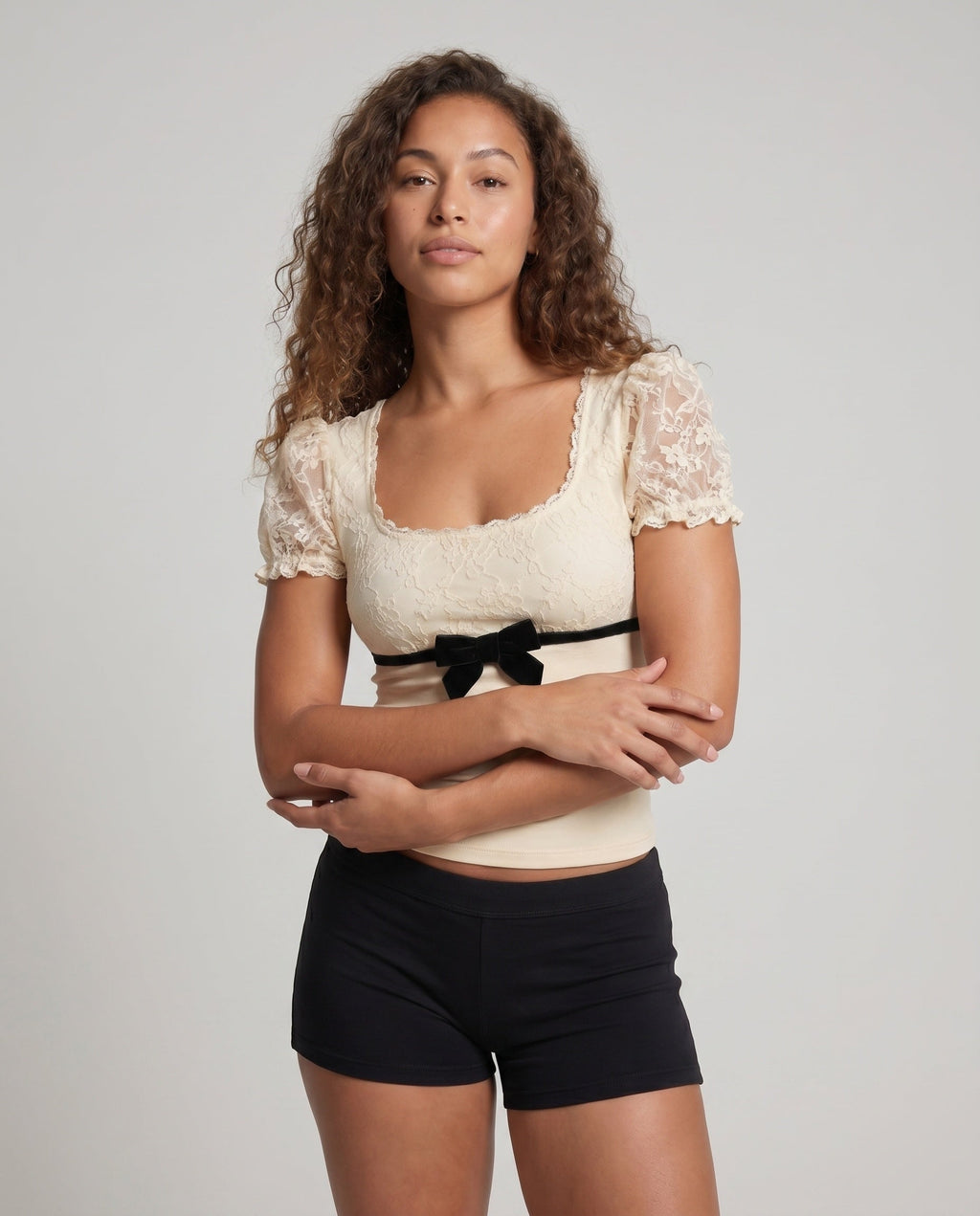 Women's Lace Top with Voluminous Ruffle Edges and an Elegant Waistband - Upper Body View