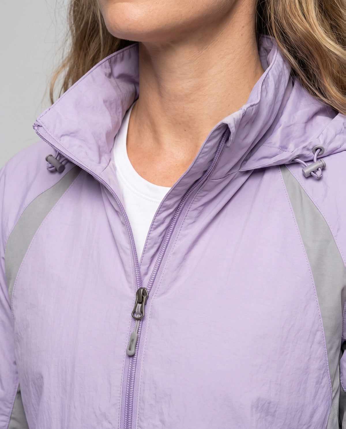 Women's Lightweight Sports Jacket with Adjustable Hood Area - Close-Up Detail