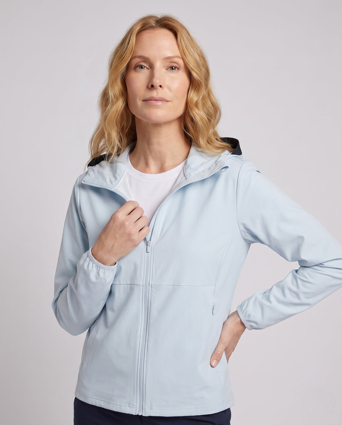 Women's Lightweight Functional Jacket with Stowable Hood Design - Upper Body View