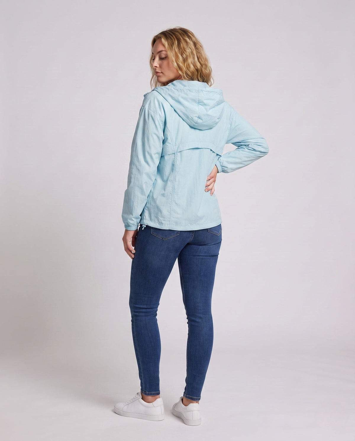 Women's Lightweight Outdoor Jacket with Packable Hood Design - Back View