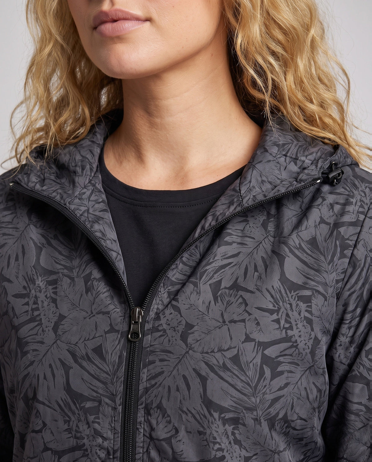 Unisex Ultralight Tropical Leaf Pattern Hooded Windbreaker - Close-Up Detail
