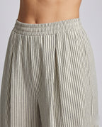 Women's High-Waisted Pleated Trousers with Wide Legs - Close-Up Detail
